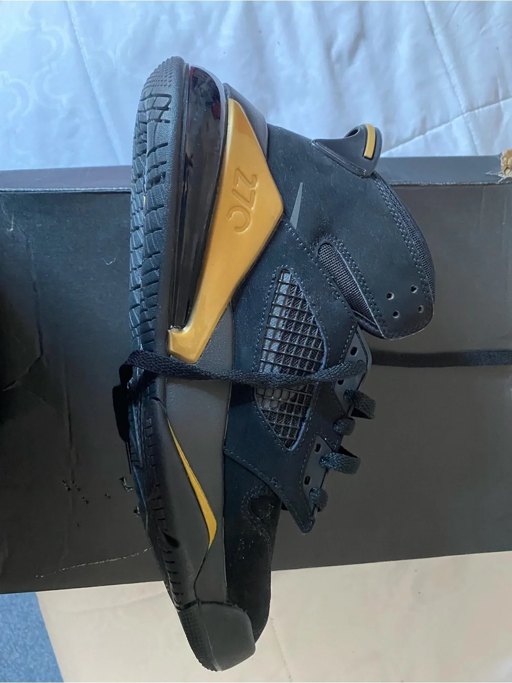 Jordan Men's Black Suede Sneakers with Gold Accent